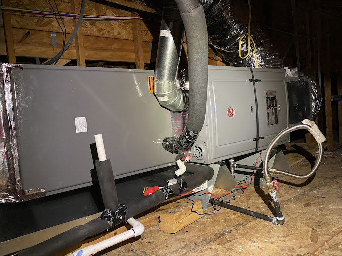 Air handler installed in an attic during a Texas Heatwave AC system replacement