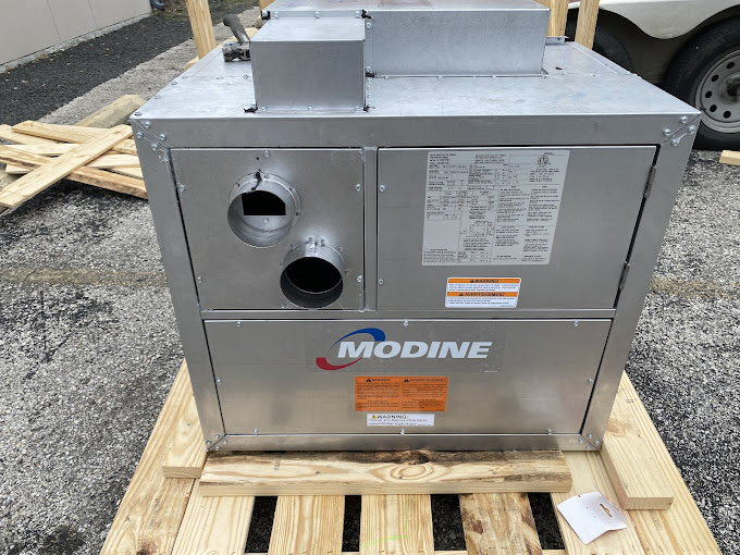 New packaged HVAC unit staged for a Texas Heatwave commercial installation