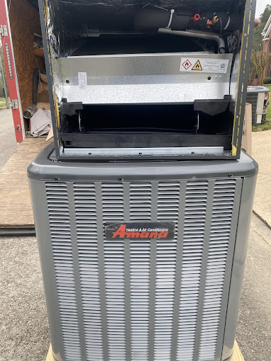 Texas Heatwave AC and Heating crew installing a new Amana air conditioning system in Houston, TX