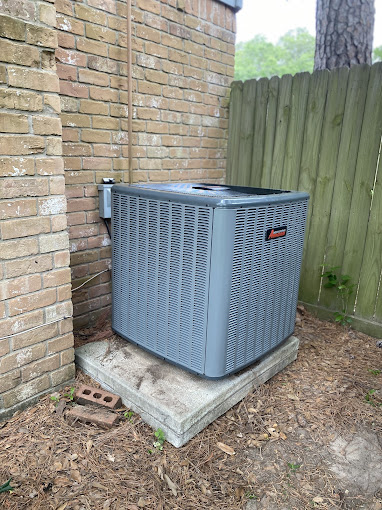 Amana AC condenser unit installed by Texas Heatwave AC and Heating at a Weslaco, TX home